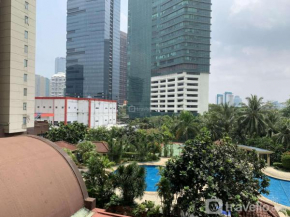 Comfy and Elegant 2BR at Sudirman Tower Condominium Apartment By Travelio